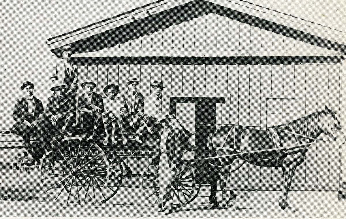 wiring department traveling by horse and buggy